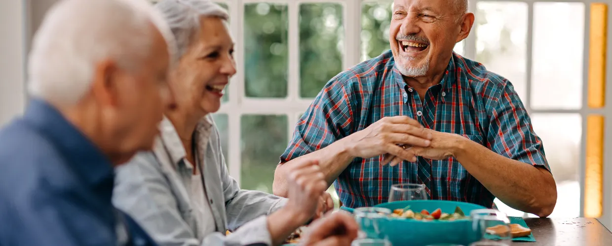 Senior citizens eating breakfast