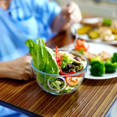 salad and food in a hospital room